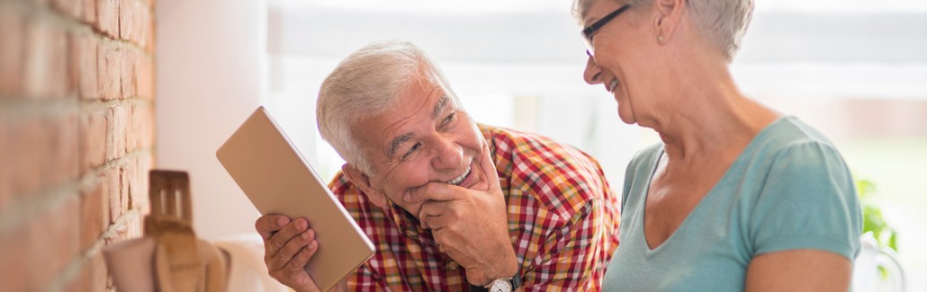 Senior couple discussing retirement planning.